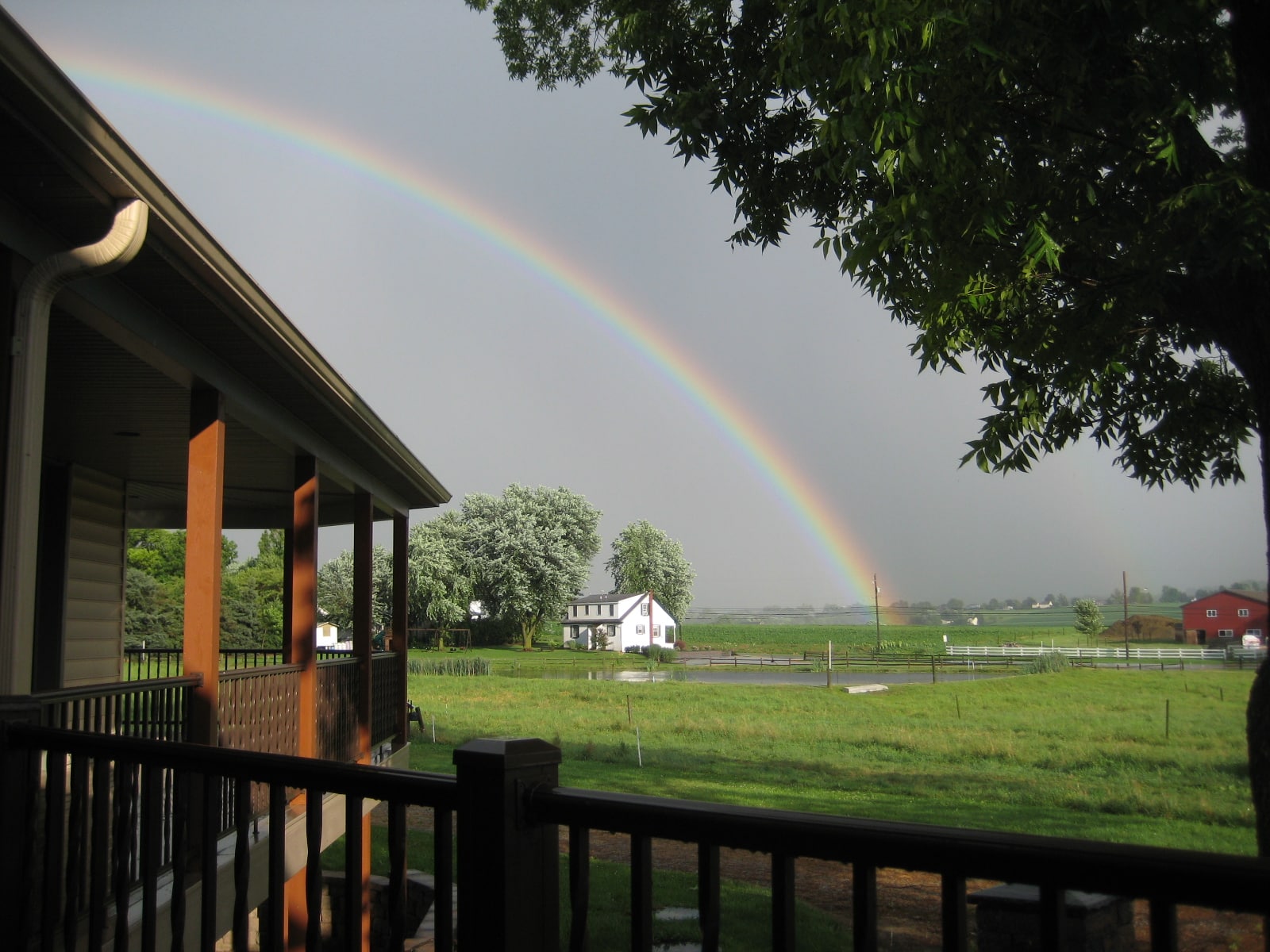 Rainbow over Lancaster County farmland from the Verdant View farm house porch.