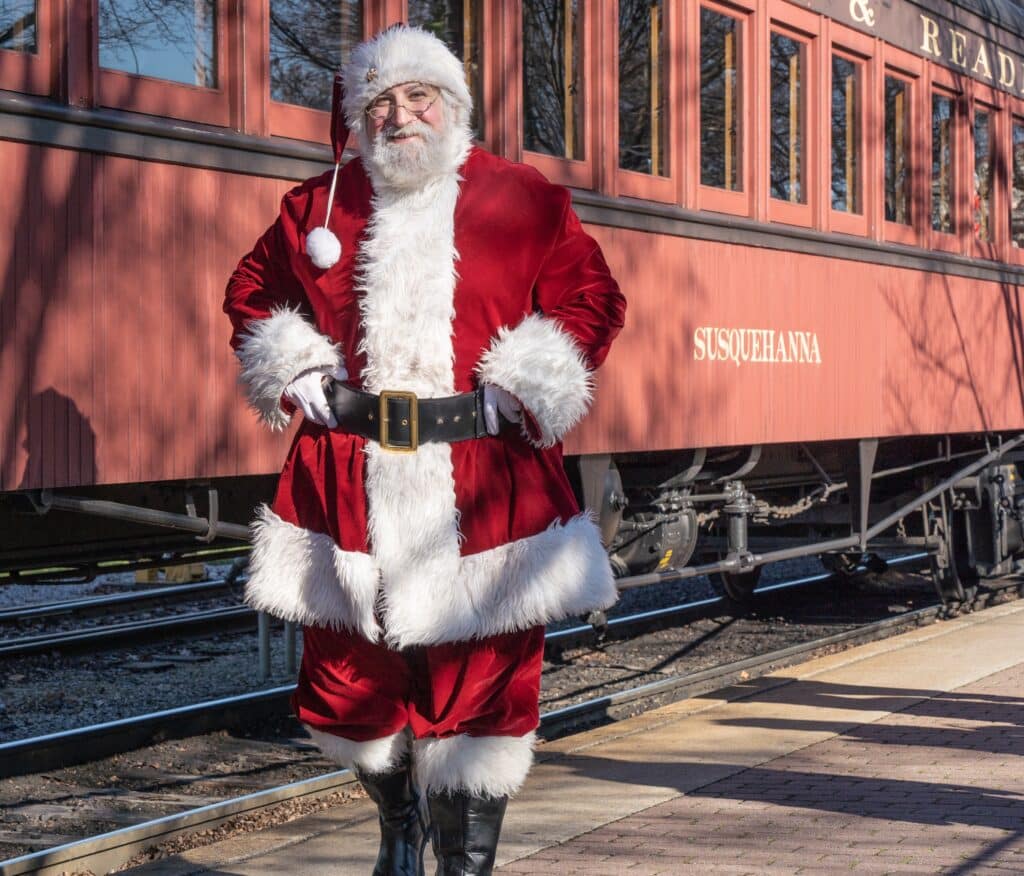 Santa Claus greets guests at the Strasburg Christmas Train.