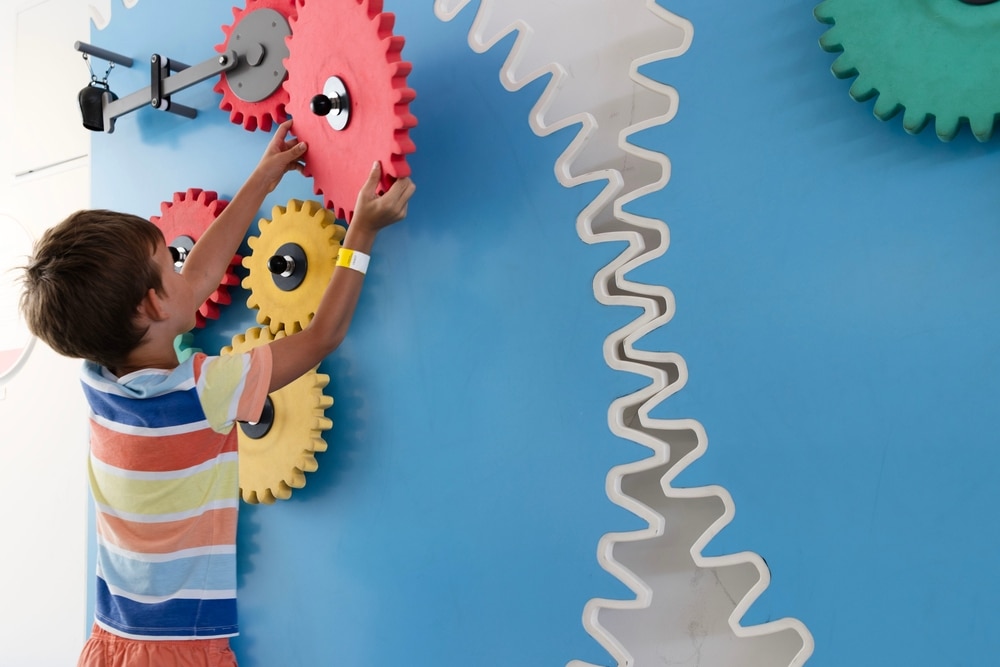 Child interacting with exhibit at Lancaster Science Factory
